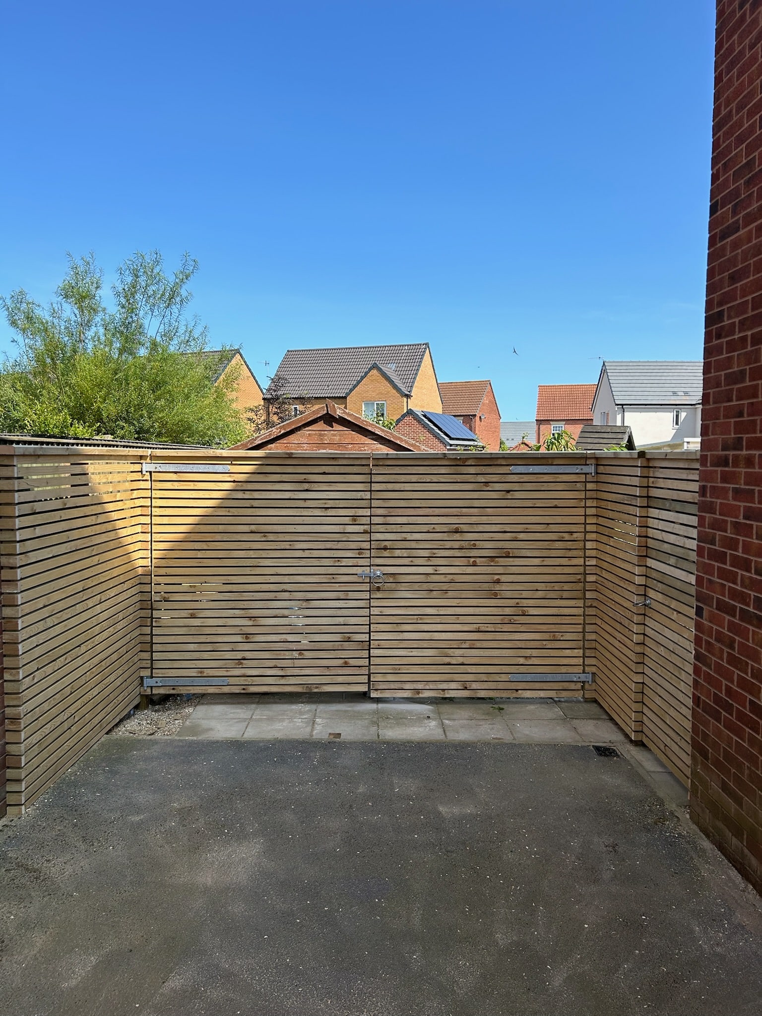 Custom built door and fence, external to the house